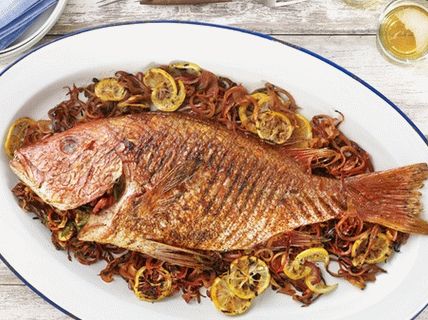 Фотографија шпанске пржене рибе на жару